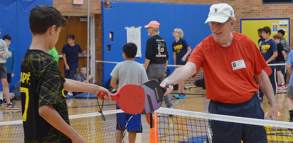 Norup students playing pickleball with seniors