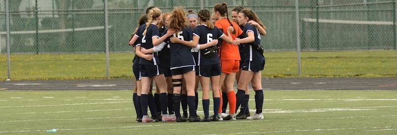 Girls Soccer Huddle before game