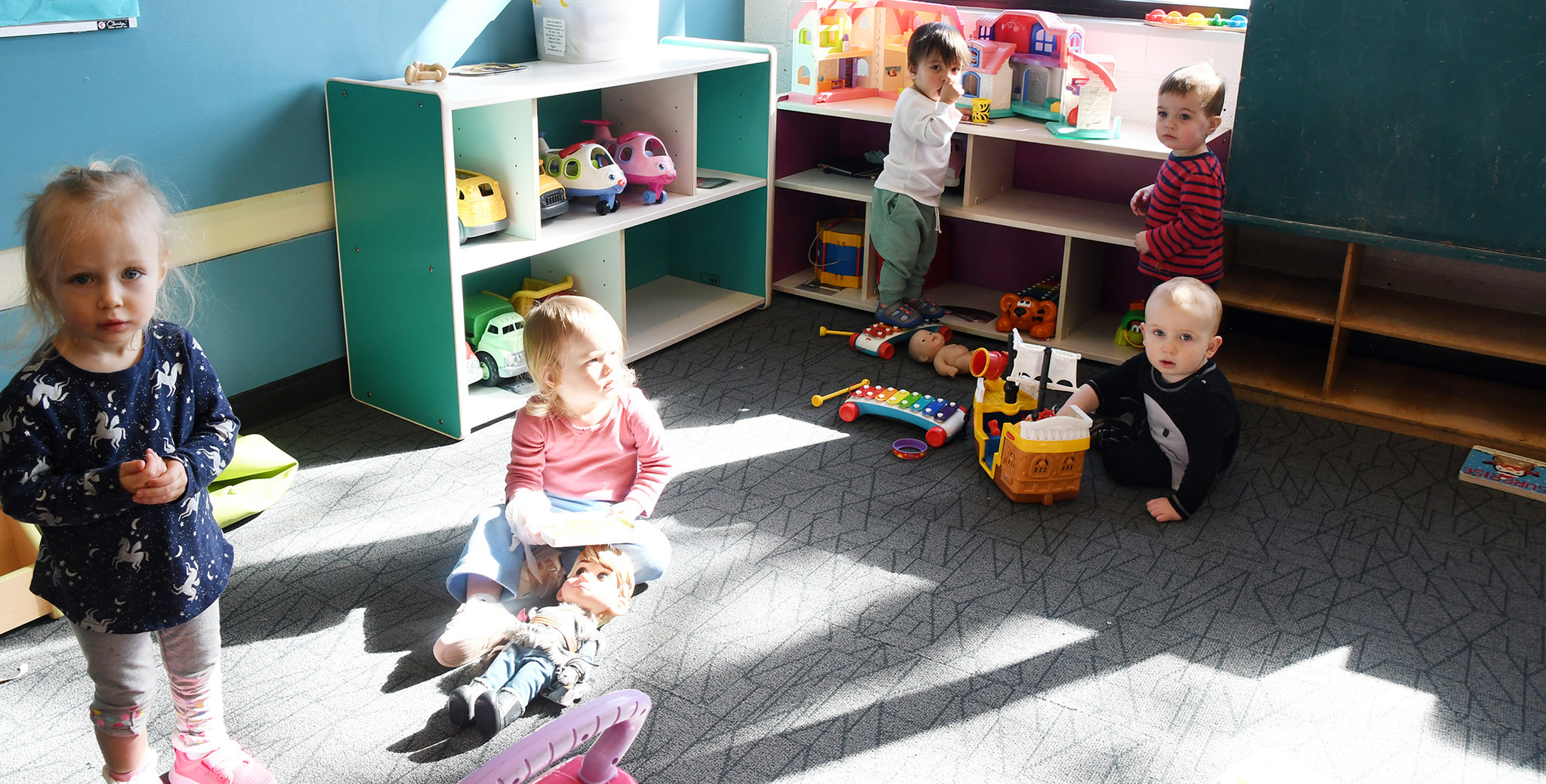 Children sitting and play together